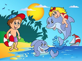 Image showing Summer beach with kids and dolphins