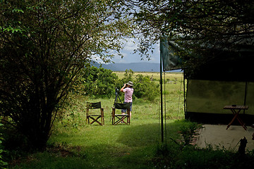 Image showing Woman by safari tent on Masai Mara