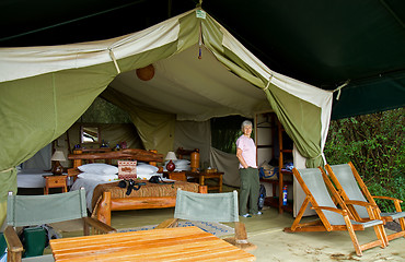 Image showing Woman in safari tent on Masai Mara