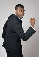 Image showing Business man showing his strength