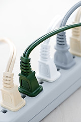 Image showing Wires plugged into power bar