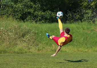 Image showing Acrobatic soccer player