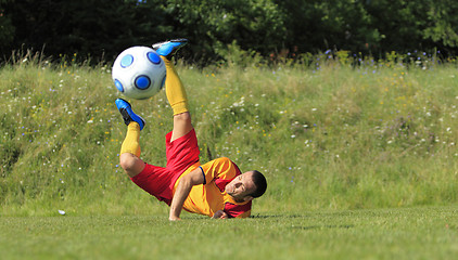 Image showing Acrobatic soccer player