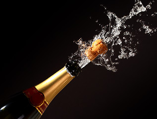 Image showing champagne bottle eruption