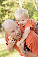 Image showing Father and Son Piggyback in the Park