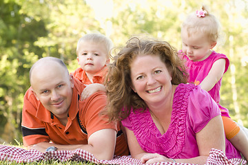 Image showing Happy Young Family with Twins Portrait in Park