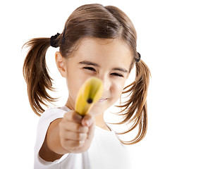 Image showing Girl shoot with a banana