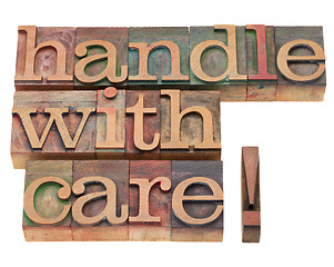 Image showing handle with care in letterpress type