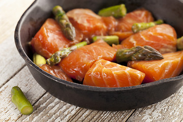 Image showing salmon and asparagus stir fry
