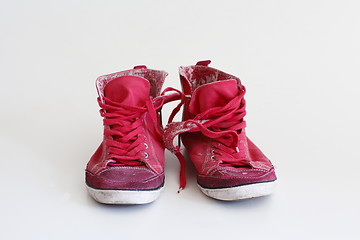 Image showing Old sneakers red