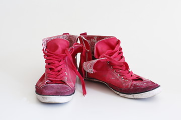 Image showing Old sneakers red