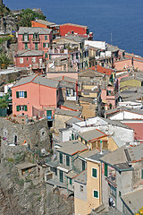 Image showing Houses muddled on a rocky spur.