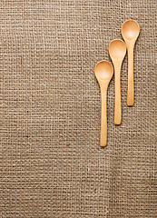 Image showing Linen background with spoon