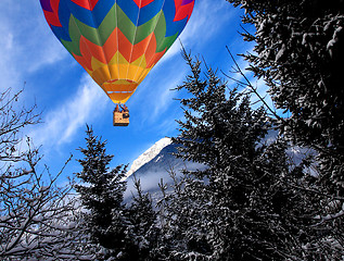 Image showing Mountain in winter time and balloon