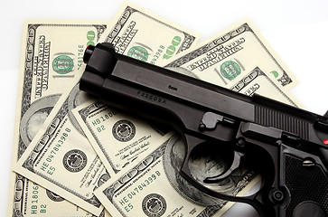 Image showing pistol and dollar