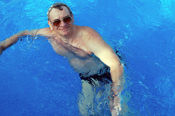 Image showing senior man in the swimming-pool