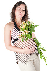 Image showing Portrait of pretty pregnant woman with flowers
