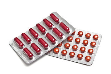 Image showing Red pills and capsules