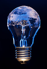 Image showing Light bulb covered with ice