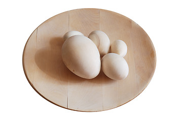 Image showing turned wooden blank eggs on the dish