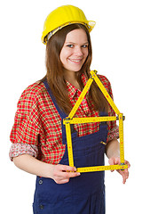 Image showing Friendly craftswoman with folding rule