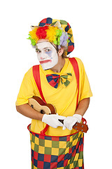 Image showing Colorful clown with ukulele