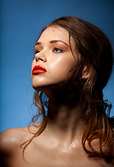 Image showing Glossy skin, red lips and curly hair