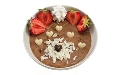 Image showing Mousse with strawberries and chocolate hearts
