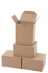 Image showing Brown cardboard boxes arranged in stack