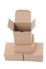 Image showing Brown cardboard boxes arranged in stack