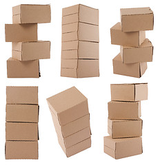 Image showing Brown cardboard boxes arranged in stack