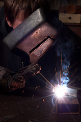 Image showing A factory welder at work