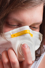 Image showing Girl wearing protective mask