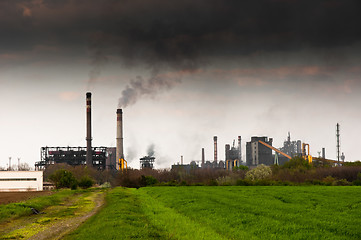 Image showing Power plant emitting dark black smoke entoxicating the world