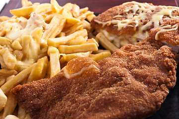 Image showing Cordon bleu with fries and cheese