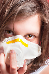 Image showing Girl wearing protective mask