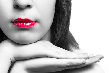 Image showing Lips of a girl with her hands in selective tones