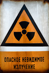 Image showing Russian Beware of radiation sign in metal