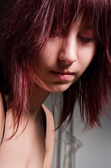 Image showing Beautiful young girl looking depressed