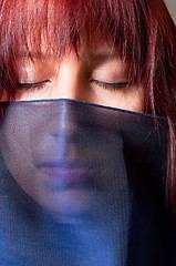 Image showing Girl in scarf with closed eyes