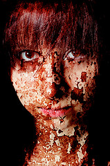 Image showing Dark art portrait of a girl with cracks and old paint