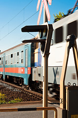 Image showing A european train in motion with lamp