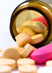 Image showing A bottle of pills on white isolated background