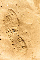 Image showing Closeup of a footprint in the sand