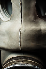 Image showing Closeup of a gasmask with blurs