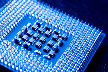 Image showing silicone chip cpu showing mounting pins in blue