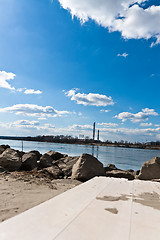 Image showing Shore of a river with focus on factory