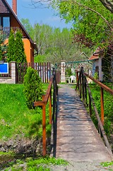 Image showing A bridge leading to an inn