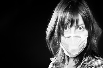 Image showing girl wearing protective mask in black and white