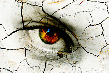 Image showing Dark art texture of a woman's eye with cracks